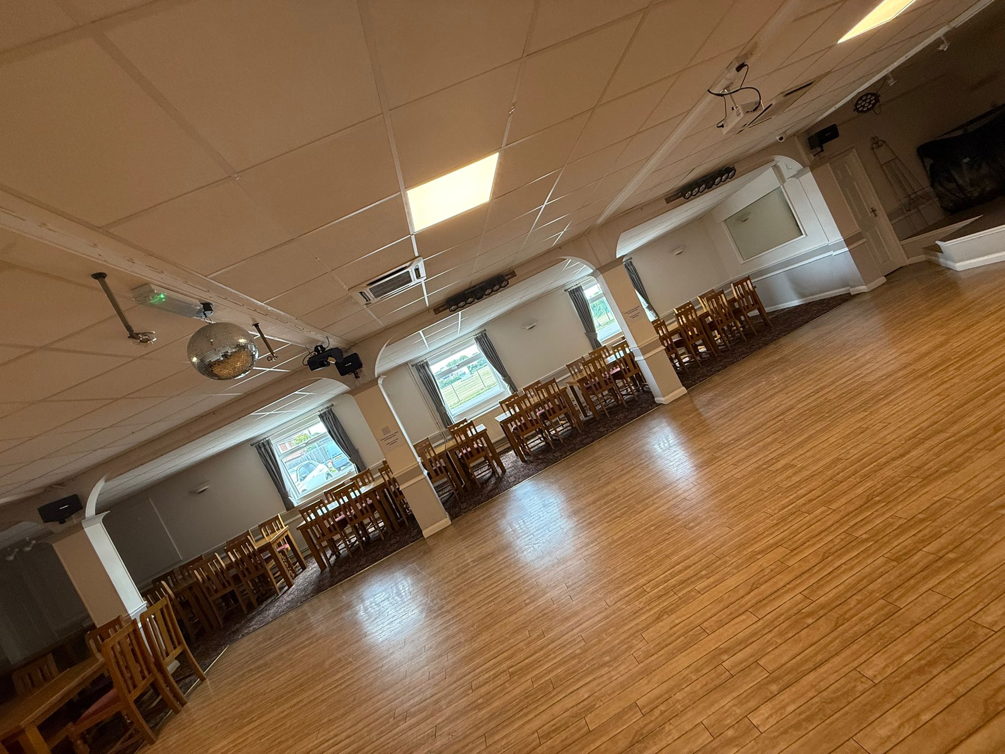 Tables and seating arranged inside the Main Hall